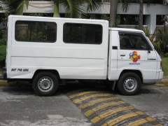 Note the logo on the van door