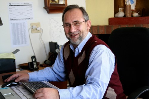 Bishop Adam Musialek at his desk in De Aar. He has been hosting Fr. Tom Cassidy during the former provincial superior's visit to the Diocese of De Aar. 