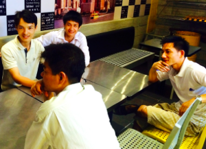 Some of Fr. Tom's students out for a final pizza night with their teacher.