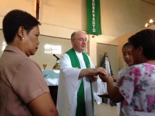 Fr. Steve shares communion