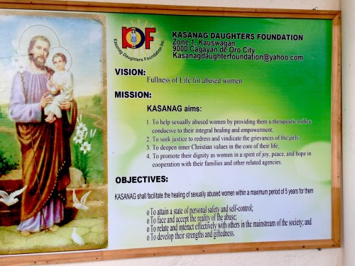 A sign describing the Kasanag Daughters Foundation