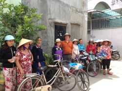 Parents wait to pick up their children from school