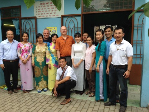 Fr. Rino and Fr. Steve with school staff