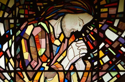 The stained glass window behind the altar at the novitiate chapel in India.