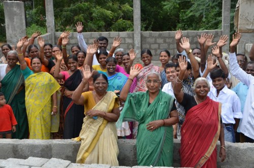 Parishioners stand in the foundation of their evolving sub-station church in Nambur. The photo was taken before Fr. Tom's visit to the area so more work has been done than what is seen here. 