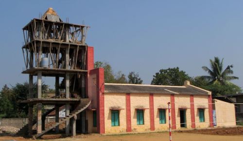 The new bell tower going up at Sacred Heart Church in Vempada.