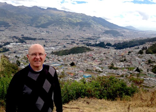 Fr. Steve with Quito in the background. He describes the backdrop as "our parish." Santa María de la Argelia consists of nine chapels that serve over 50,000 people