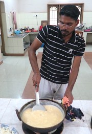 Scrambling the eggs for an American breakfast!